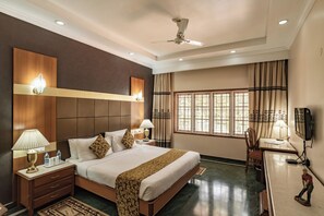 Nature View Permier Room | Desk, laptop workspace, iron/ironing board, bed sheets - Eagleton - The Golf Resort (Ramanagara)
