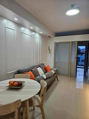 Apartment, 1 Bedroom, Smoking | Living room - Scandi-inspired Pasay Apartment for Rent - Entire House With Balcony Facing MOA (Pasay)