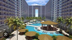 Apartment, 1 Bedroom, Smoking | Pool | Outdoor pool - Scandi-inspired Pasay Apartment for Rent - Entire House With Balcony Facing MOA (Pasay)