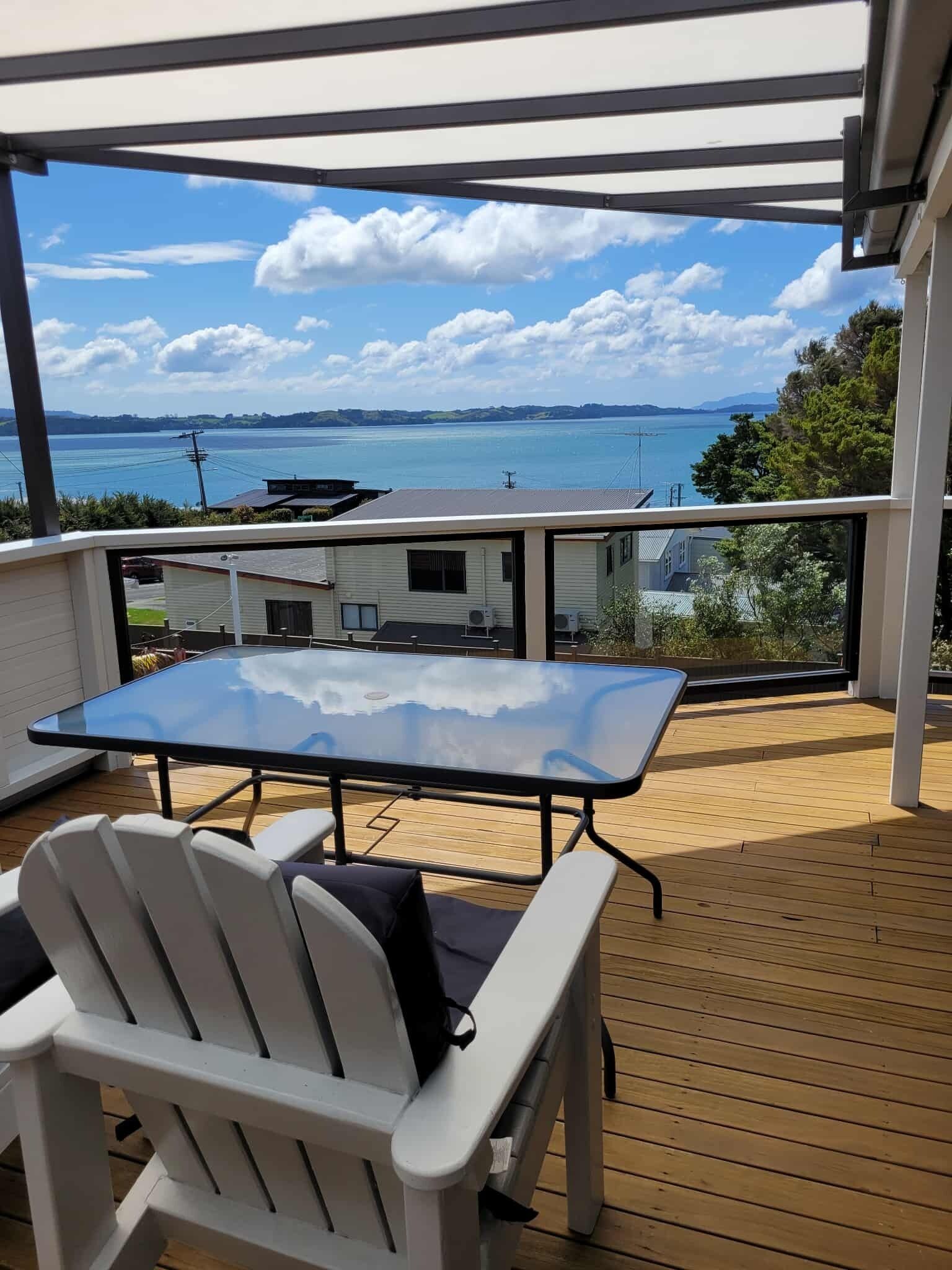 Upstairs deck with pergola - view towards Algies Bay
