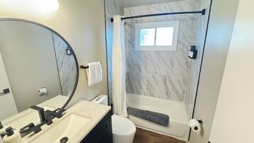 Hair dryer, towels, soap, toilet paper