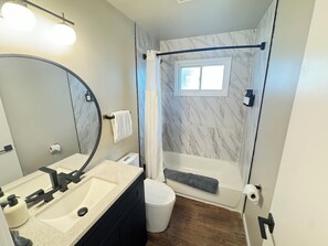 Hair dryer, towels, soap, toilet paper