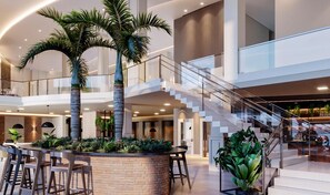 A spacious lobby with a central seating area, palm trees, and a staircase connecting multiple floors. - Sao Pedro Thermas Resort (São Pedro)