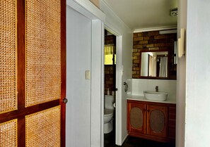 Shower, towels, soap, toilet paper