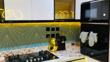 Grand Apartment, Balcony | Private kitchen