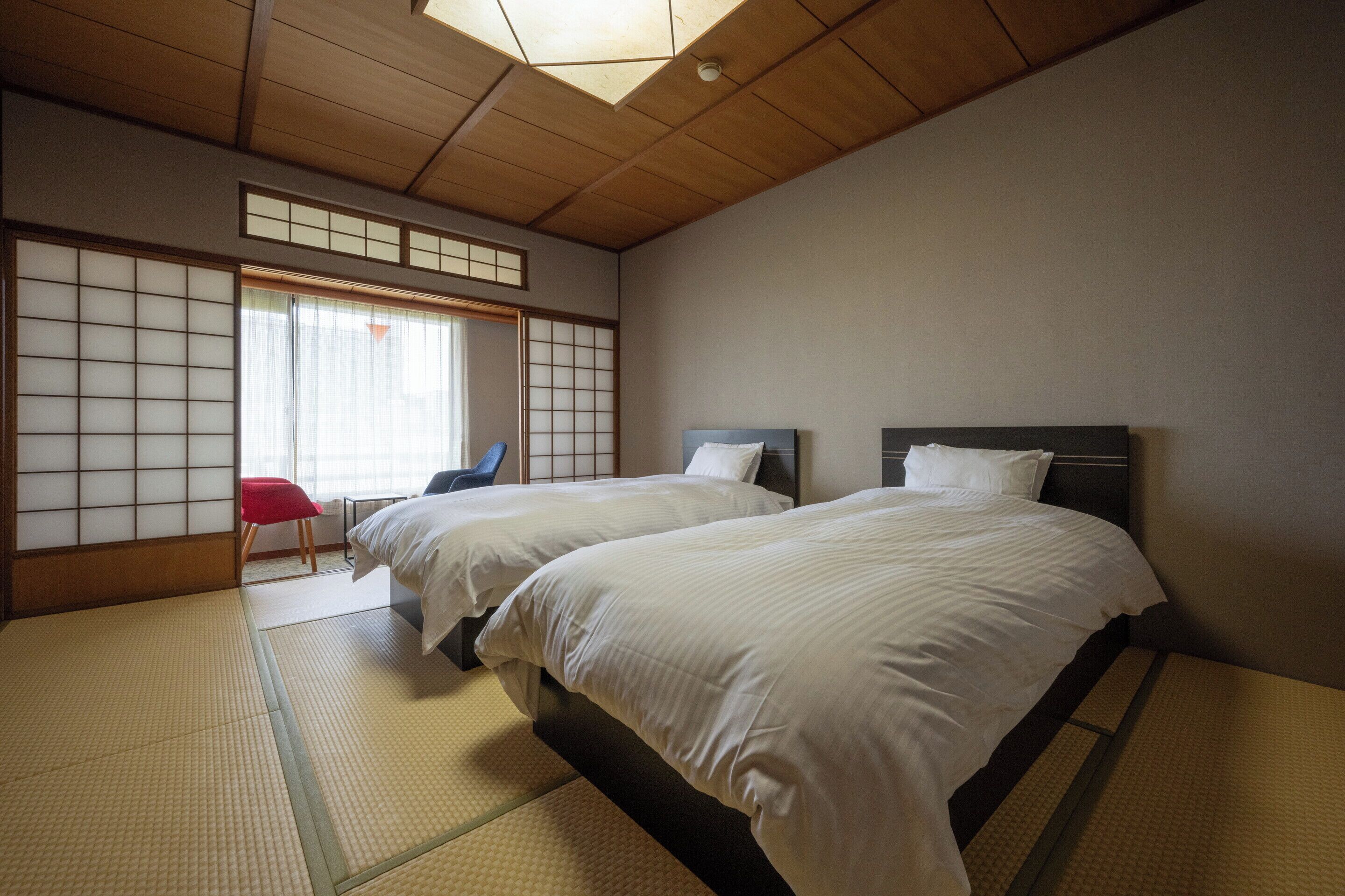 Basic Twin Room, Smoking, Garden View | Bed sheets