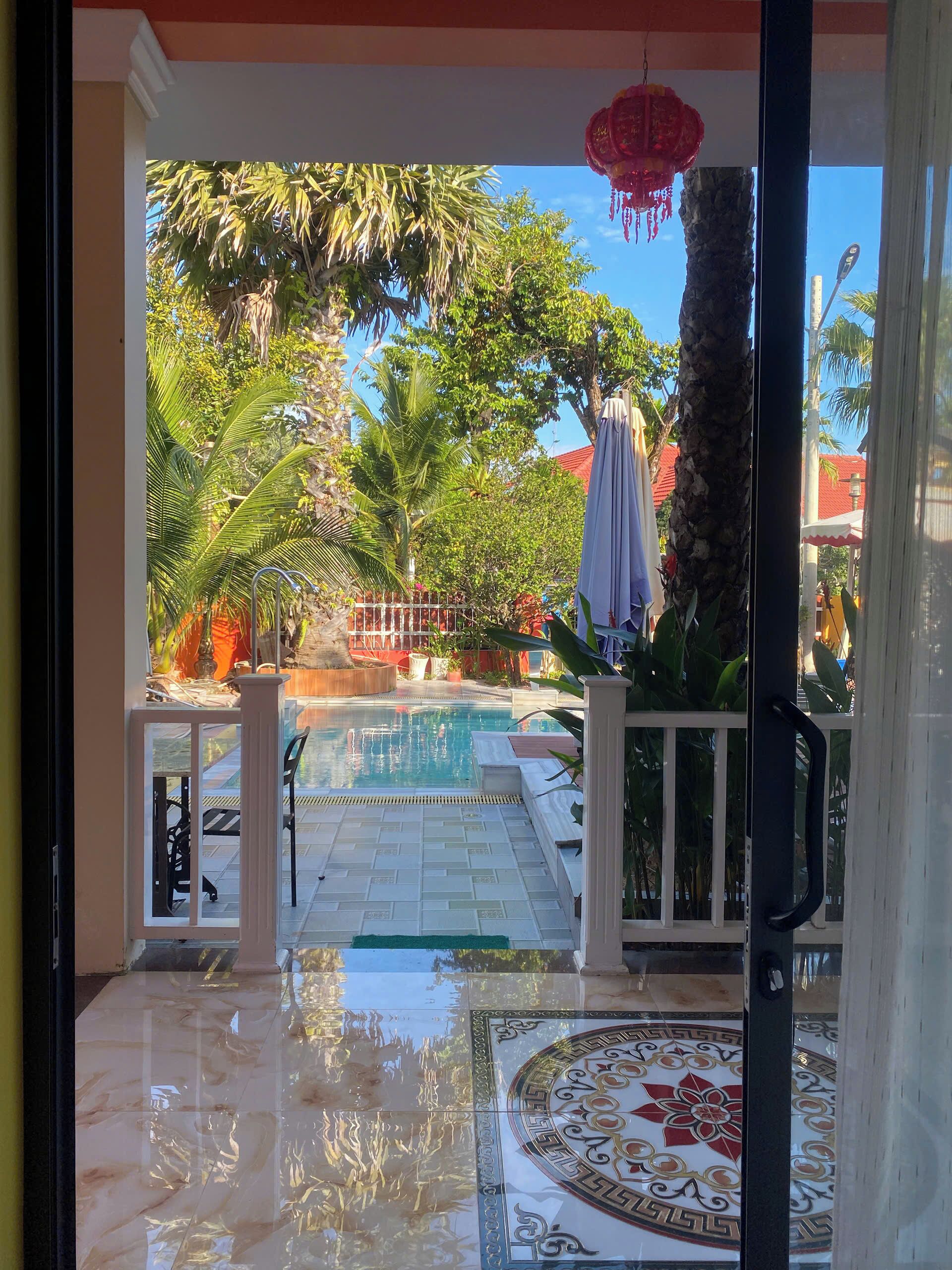 Standard Triple Room, Pool View | Terrace/patio