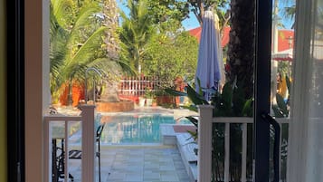 Standard Triple Room, Pool View | Terrace/patio