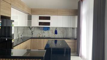 Family Apartment, Resort View | Private kitchen | Electric kettle