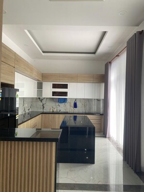 Family Apartment, Resort View | Private kitchen | Electric kettle