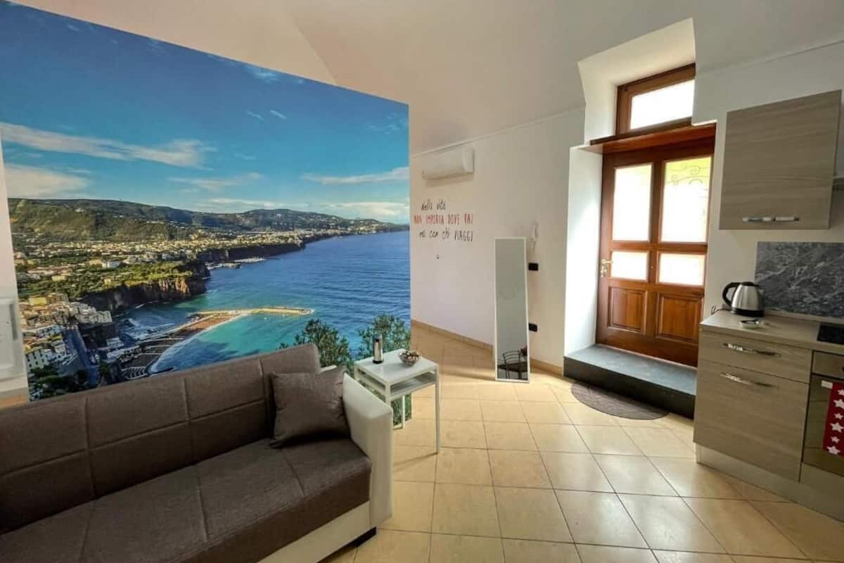 Comfort Studio | Living area | 36-inch flat-screen TV with digital channels