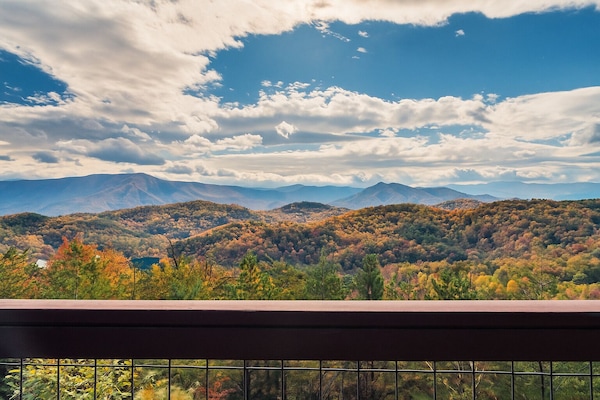 Panoramic Smoky Mountain views from the main deck — sunrise to sunset.