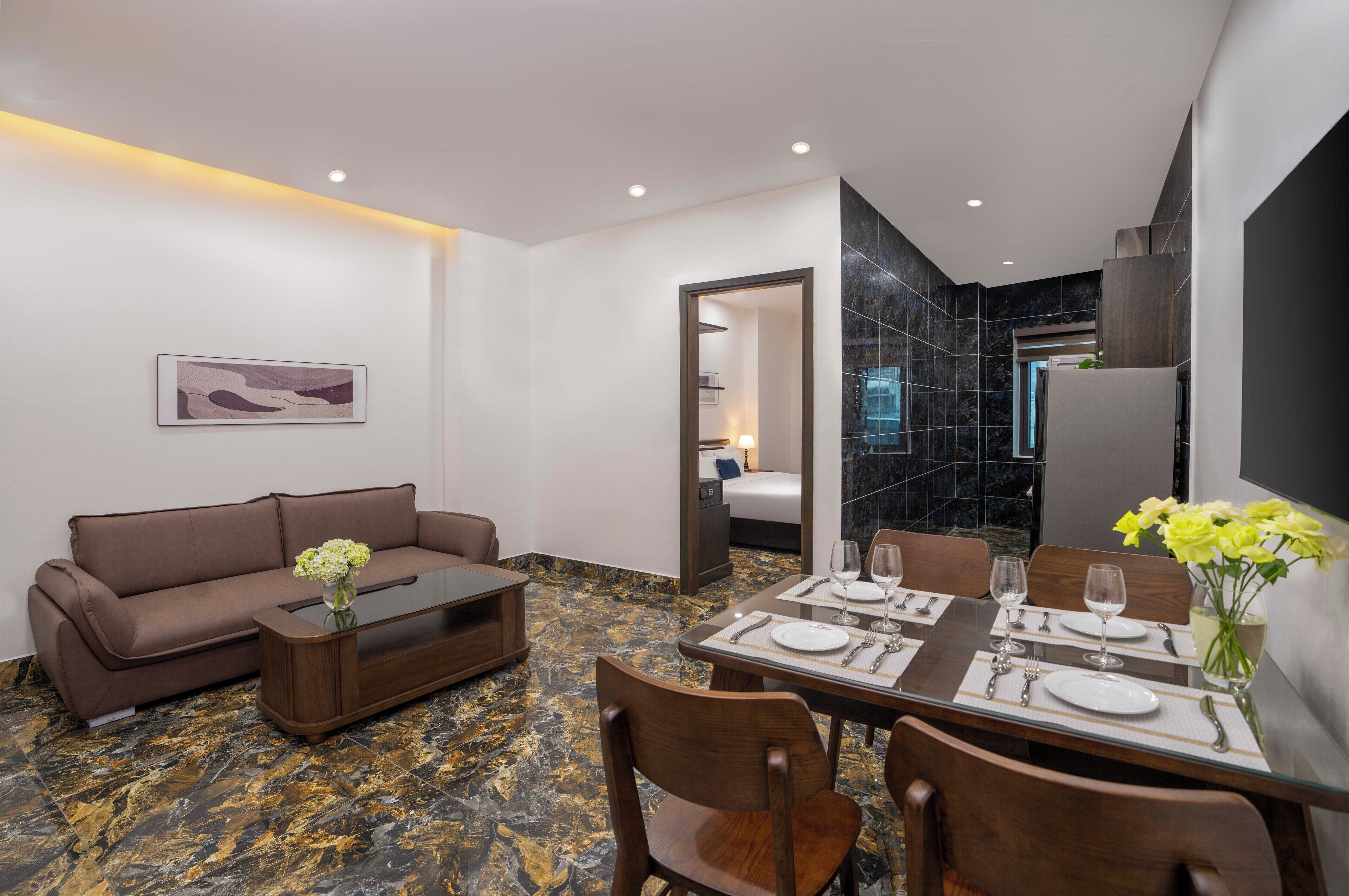 Deluxe 1 King Bed Suite | Een minibar, een kluis op de kamer, verduisterende gordijnen