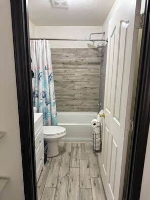 Hair dryer, towels, soap, shampoo