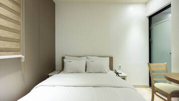 Hypo-allergenic bedding, individually decorated, desk, blackout drapes