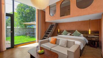 Suite destacada, vistes a la muntanya | Sala d'estar | Televisor de 50 polzades amb canals per cable