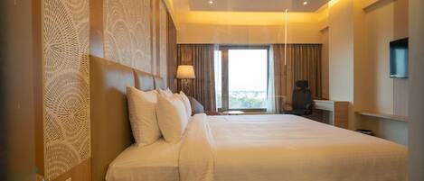 Habitación doble superior, vista a la ciudad | Ropa de cama de alta calidad y minibar