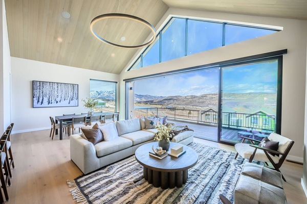 Luxury living room with floor-to-ceiling glass and Jordanelle views near Deer Valley East Village