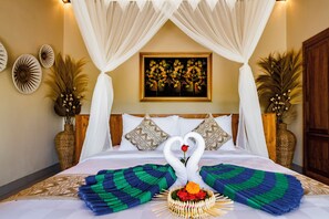 Seprai premium, bantalan ekstra lembut, minibar, dan brankas