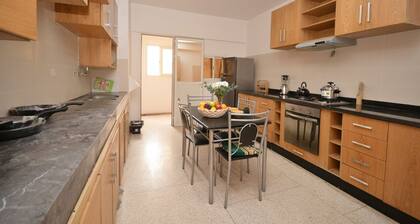 Abdelmoumen Family Haven – Crib & Comfort