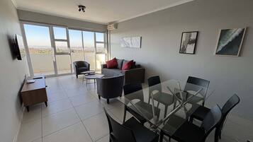 Lägenhet - utsikt mot staden | Vardagsrum