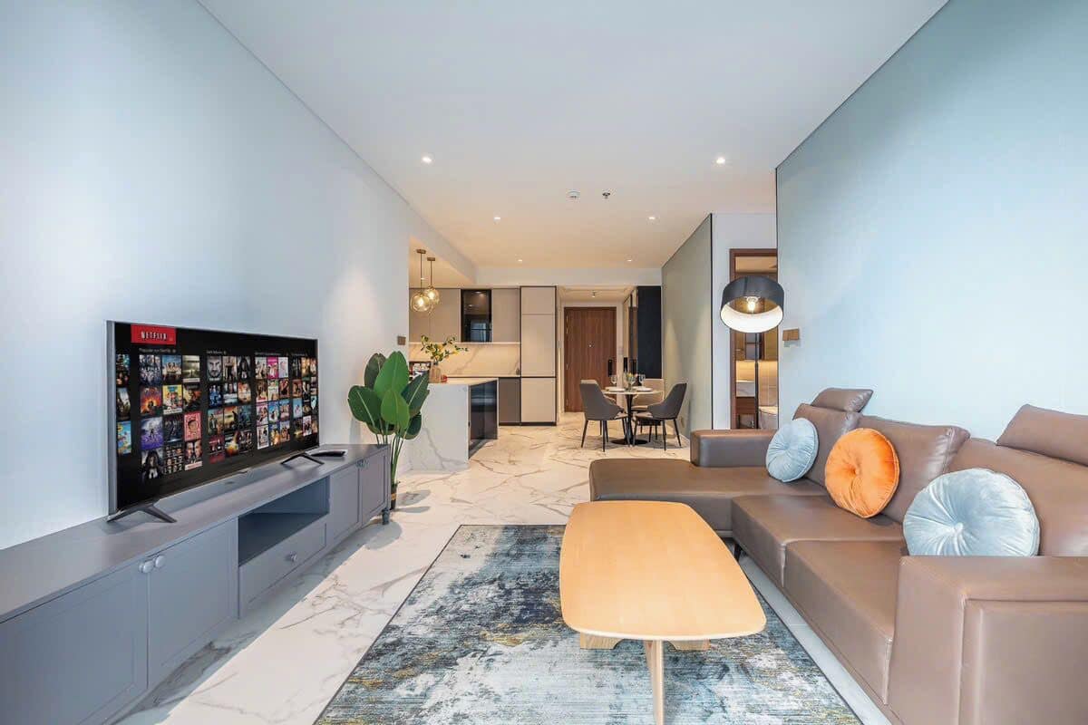 Suíte presidencial, 2 quartos, acesso ao Club Lounge, vista para a cidade | Área de estar | Smart TV 65 polegadas com canais a cabo, lareira, Netflix