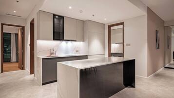 Family Suite, 3 Bedrooms, Club Lounge Access, City View | Private kitchen | Full-size fridge, microwave, oven, stovetop