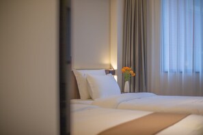 Basic Twin Room, City View | Desk, iron/ironing board, free WiFi