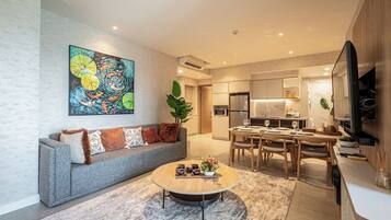 Family Suite, 3 Bedrooms, Club Lounge Access, City View | Living area | 65-inch Smart TV with cable channels, fireplace, Netflix