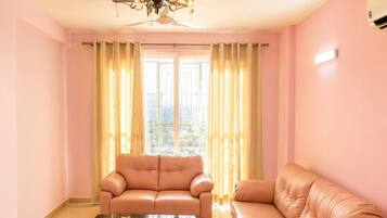 Apartment (2 Bedrooms) | Living area | TV