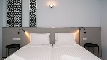 Chambre Standard avec lits jumeaux | Bureau, espace de travail pour ordinateur portable, Wi-Fi gratuit