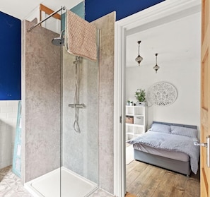 Shower, towels, soap, toilet paper