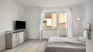 1 habitación, tabla de planchar con plancha, wifi y ropa de cama