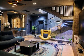 Luxury Apartment, City View | Living area - Mo's Place by Zuno Homes (Abuja)