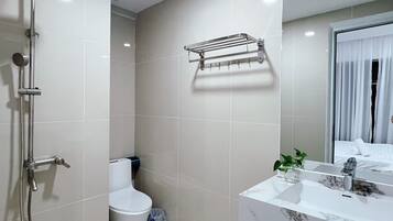 Hair dryer, towels, soap, toilet paper