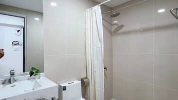 Hair dryer, towels, soap, toilet paper