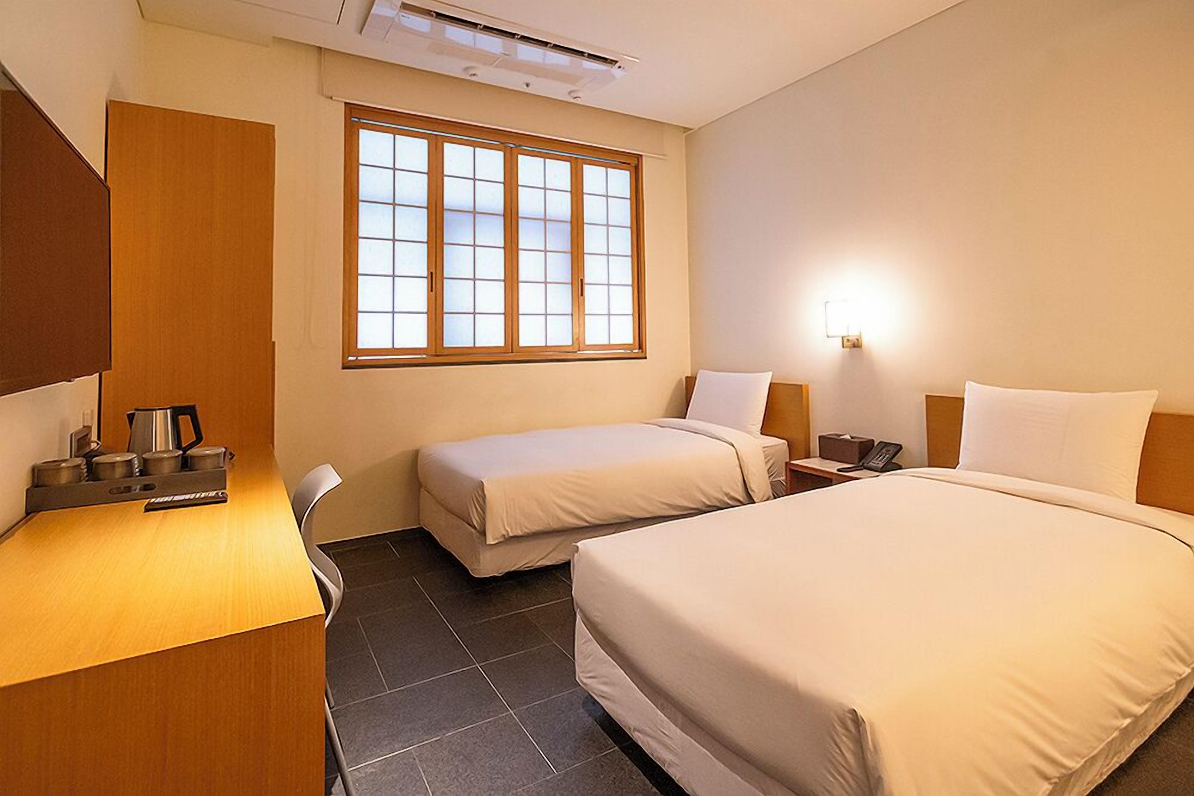 Korean Family Room | In-room safe, desk, blackout drapes, soundproofing