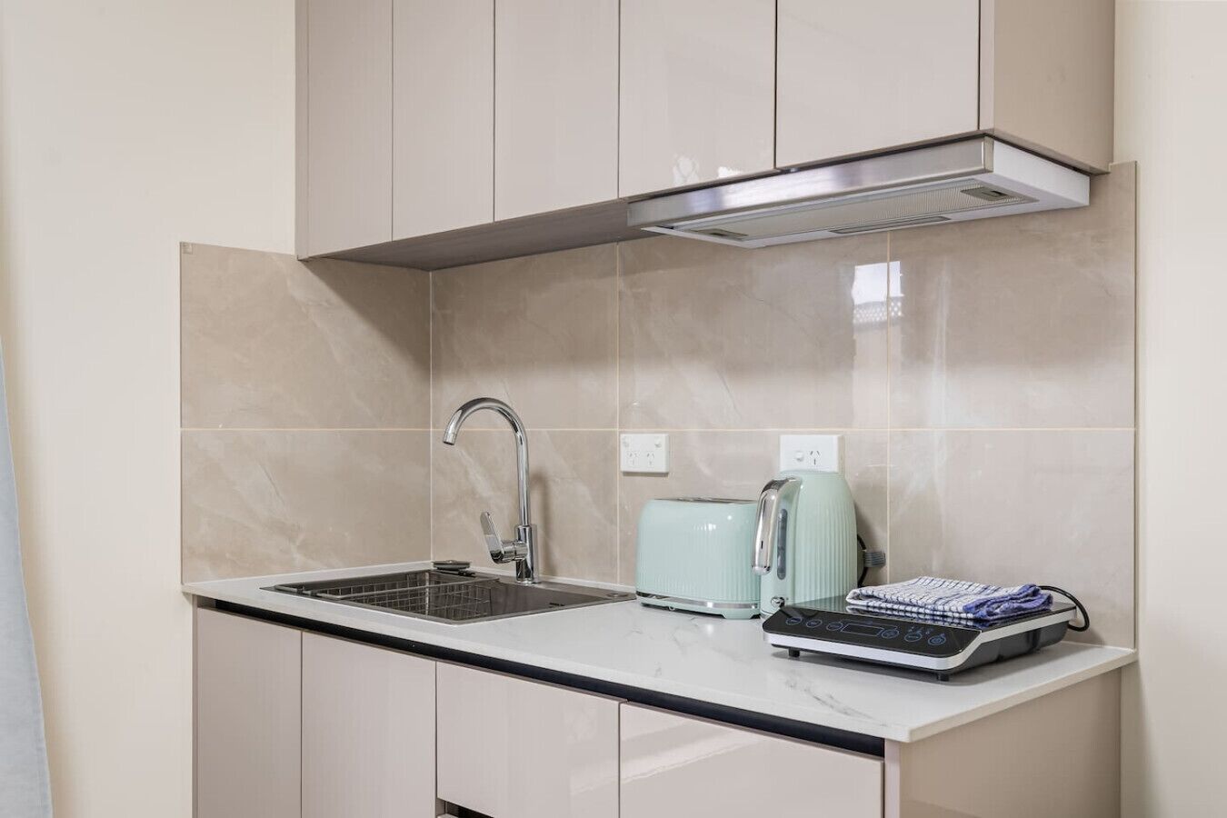 Stovetop, toaster, high chair, cookware/dishes/utensils