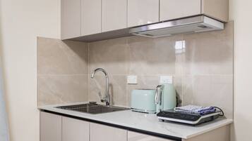 Stovetop, toaster, high chair, cookware/dishes/utensils