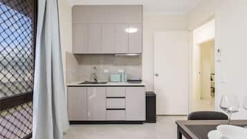 Stovetop, toaster, high chair, cookware/dishes/utensils