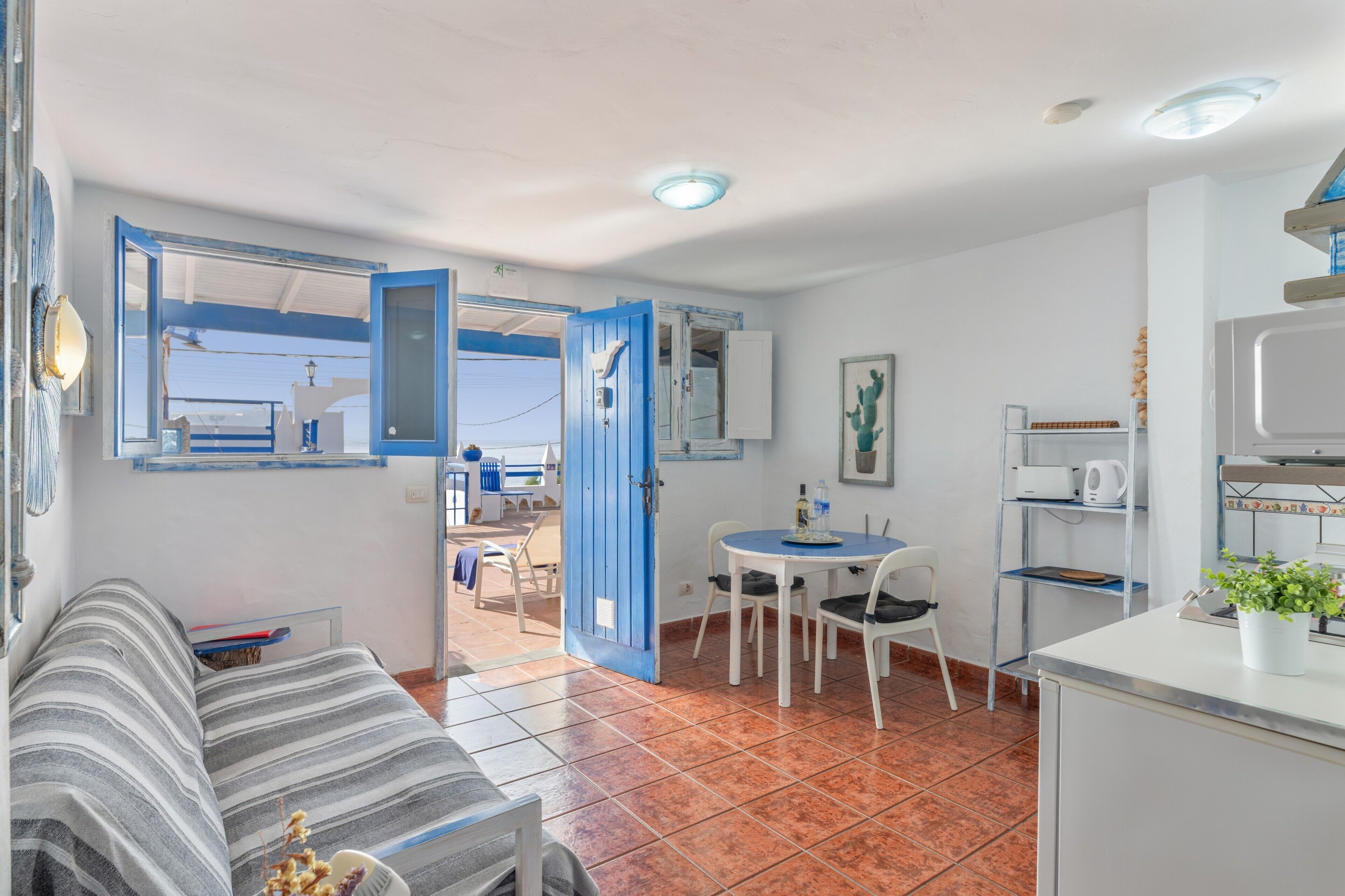 Dining. Unit 2 at "Ventanas de Lanzarote" with Shared Terrace, Sea Views & Wi-Fi