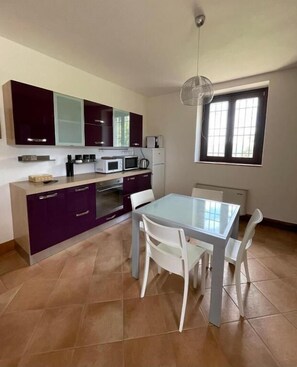 Comfort Apartment, Hill View | Private kitchen | Highchair - PODERE AURORA (Massa Marittima)