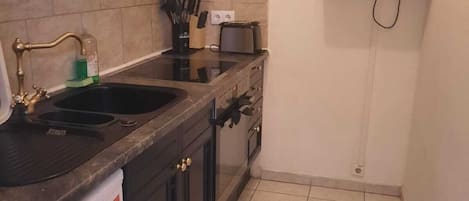Lägenhet Basic | Eget kök | Kylskåp, mikrovågsugn, spishäll och diskmaskin