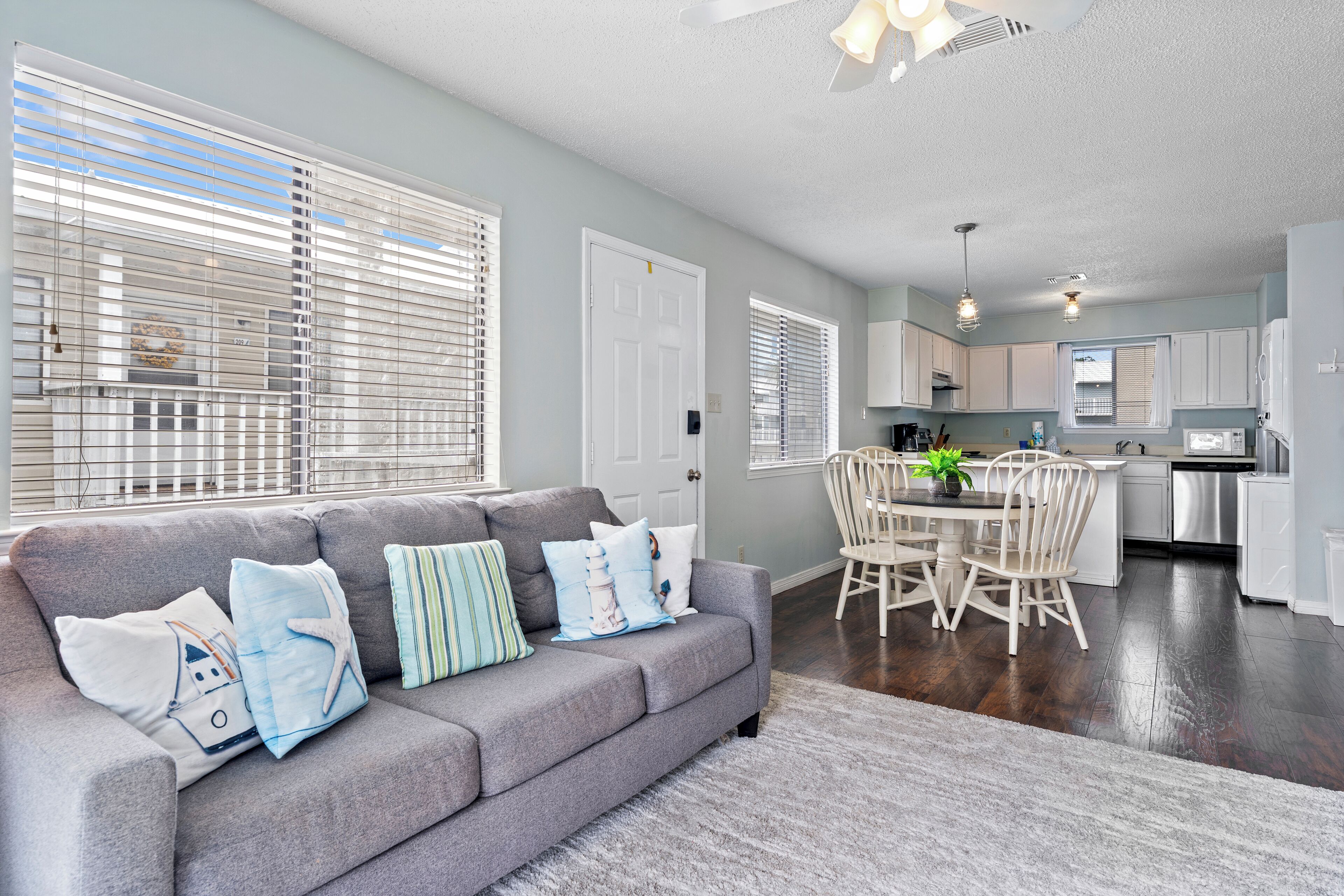 Signature Condo, 2 Bedrooms, Balcony | Living room | 50-inch Smart TV with cable channels