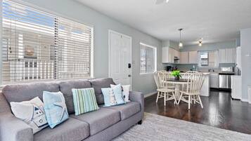 Signature Condo, 2 Bedrooms, Balcony | Living room | 50-inch Smart TV with cable channels