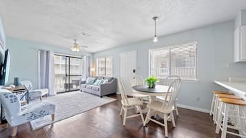 Signature Condo, 2 Bedrooms, Balcony | Living area | 50-inch Smart TV with cable channels