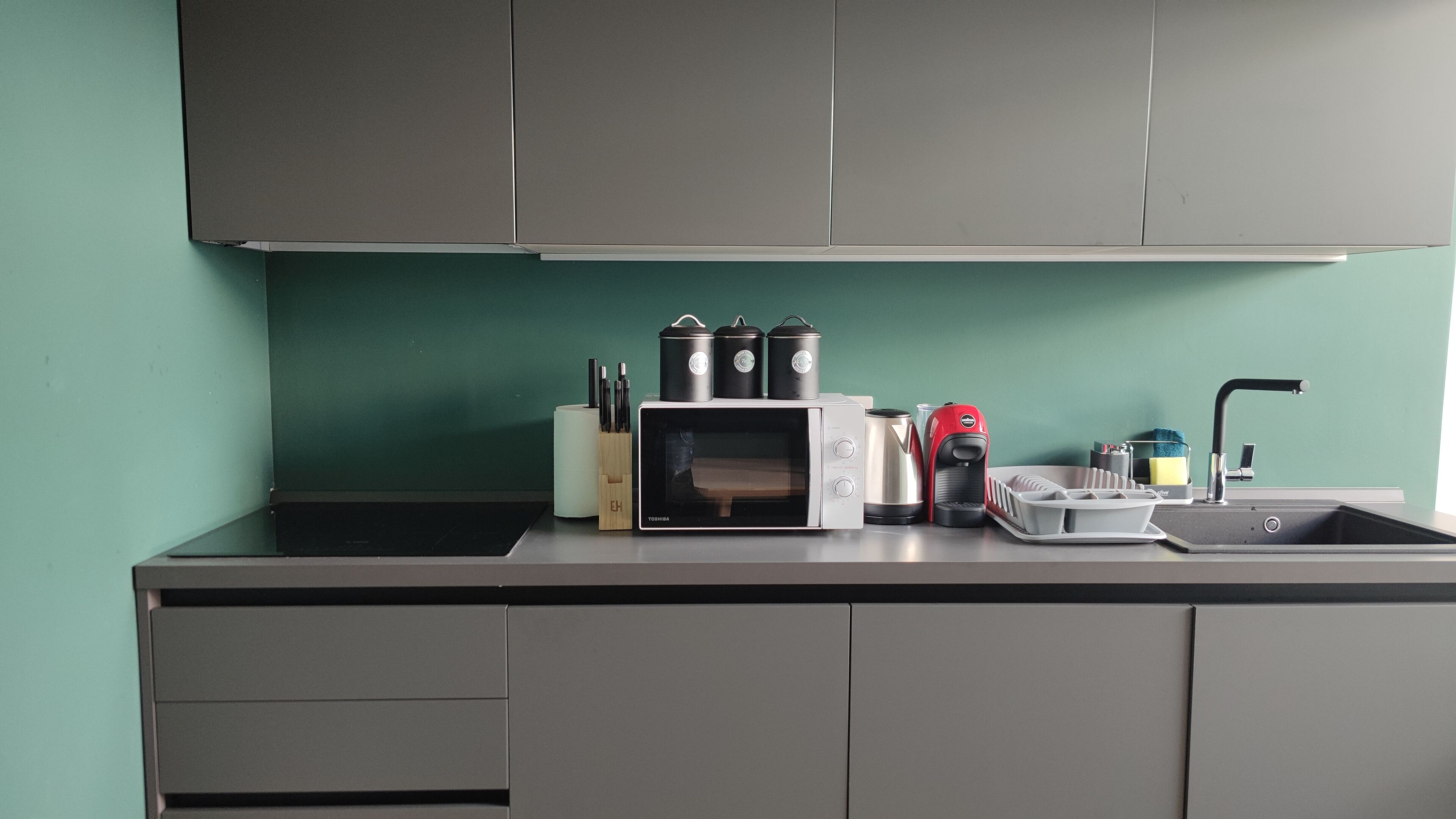 Mini-fridge, microwave, stovetop, dishwasher