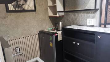 Family Quadruple Room, 2 Bedrooms | Private kitchen