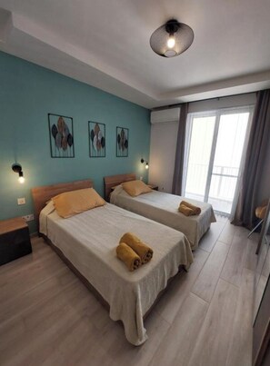 Apartment, 3 Bedrooms, Air conditioning, Beachside | Iron/ironing board