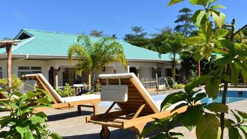 Outdoor pool, open 9:00 AM to 4:00 PM, pool umbrellas, sun loungers